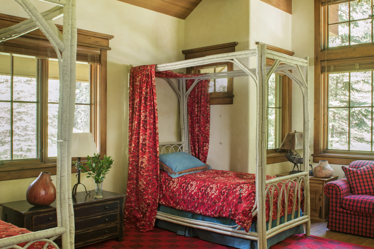 A western-themed bedroom with two twin beds